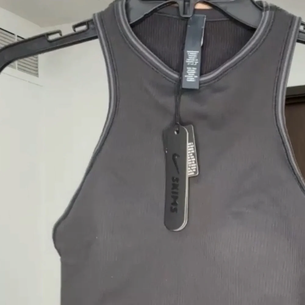 Nike Skims Ribbed Seamless Racer Front Tank in Obsidian Black - Picture 8 of 8